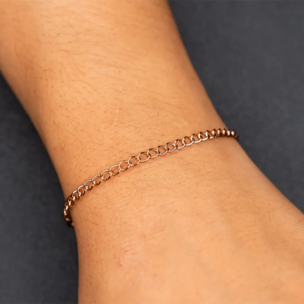 John – Edelstahl roségold plattiert am Handgelenk – Permanentschmuck Aachen